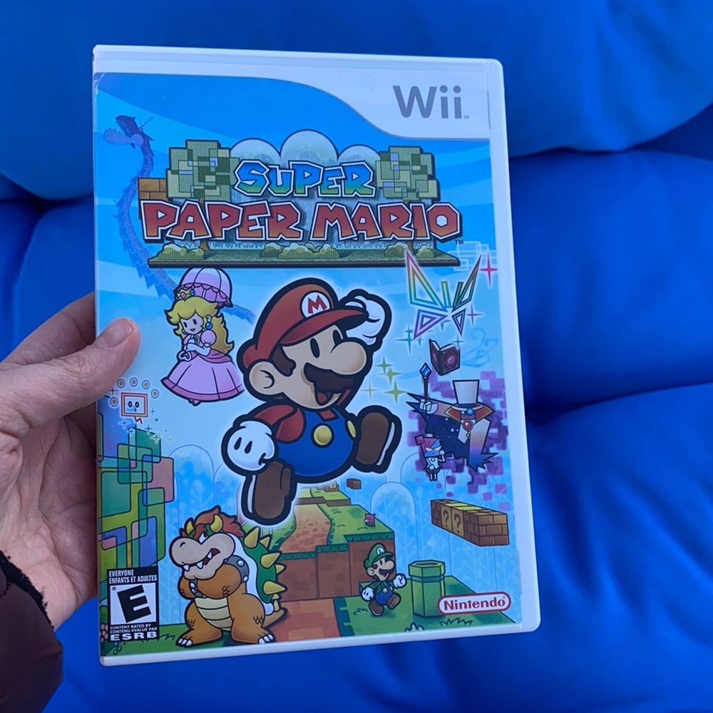 Wii Nintendo Super Paper Mario Rated Everyone Made In The 2007/ USA Guide Book
